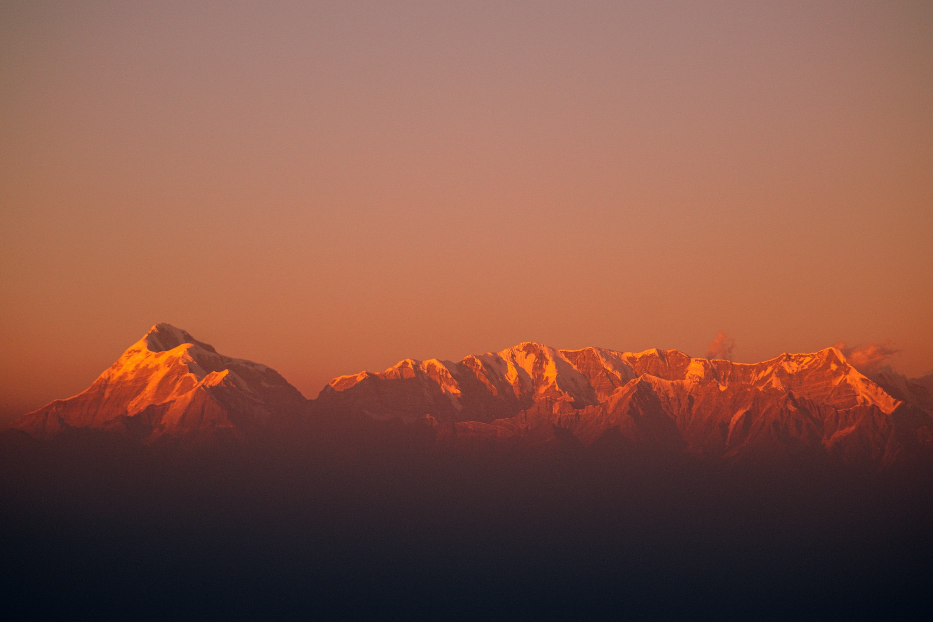 silhouette of mountains during sunset